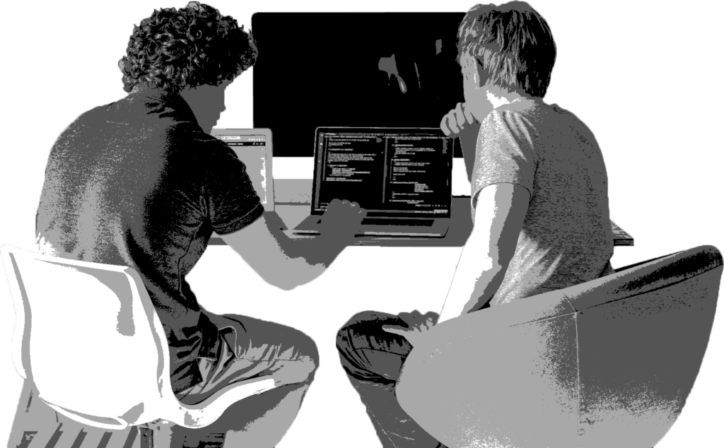 picture of two students coding